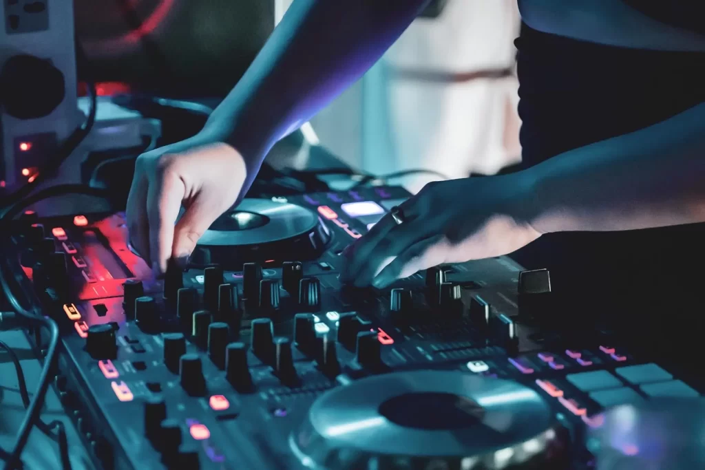 DJ using Controller in a Dubai Club